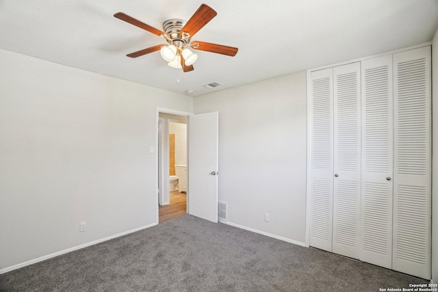 unfurnished bedroom featuring a closet, ceiling fan, and carpet flooring