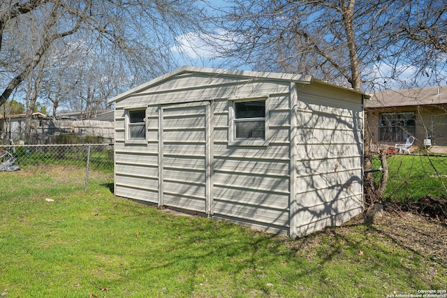 view of outdoor structure featuring a yard