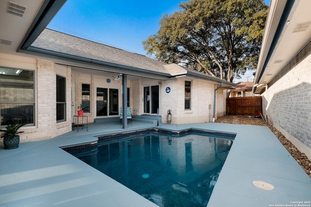 view of swimming pool featuring a patio