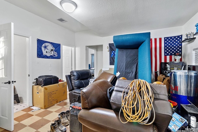 interior space featuring a textured ceiling