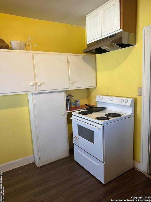 kitchen featuring dark hardwood / wood-style flooring, white cabinetry, and white electric range oven