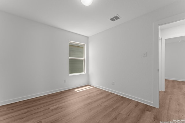 6707 Tasajillo Spgs, San Antonio, TX 78253 - unfurnished room featuring baseboards, light wood-style floors, and visible vents