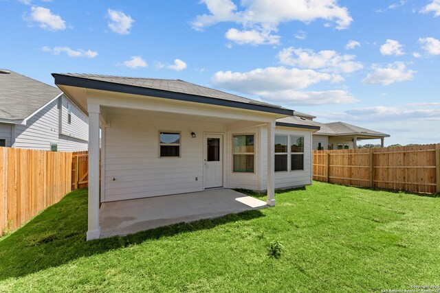 6707 Tasajillo Spgs, San Antonio, TX 78253 - back of property with a lawn, a fenced backyard, and a patio