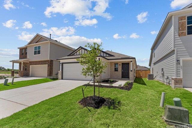 6707 Tasajillo Spgs, San Antonio, TX 78253 - view of front of home featuring fence, central air condition unit, driveway, brick siding, and a front yard