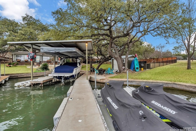 dock area featuring a yard and a water view