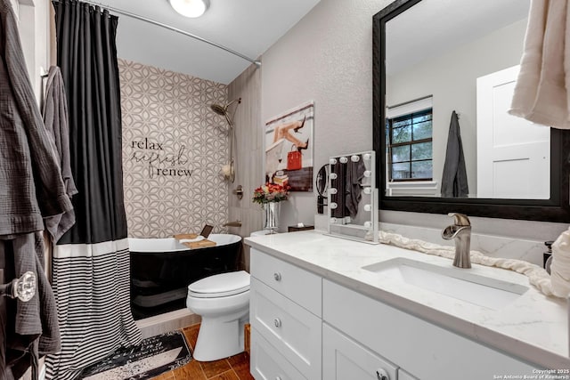 bathroom with hardwood / wood-style floors, toilet, vanity, and walk in shower