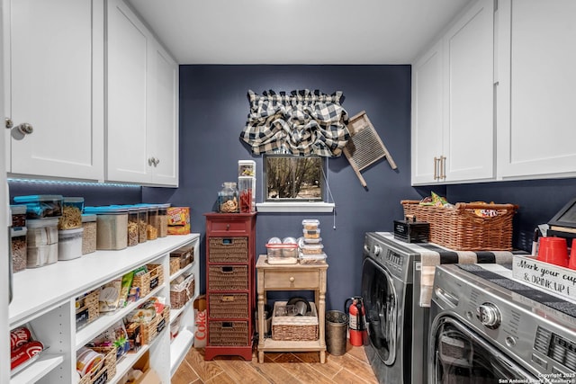 laundry area with cabinets and washer and dryer