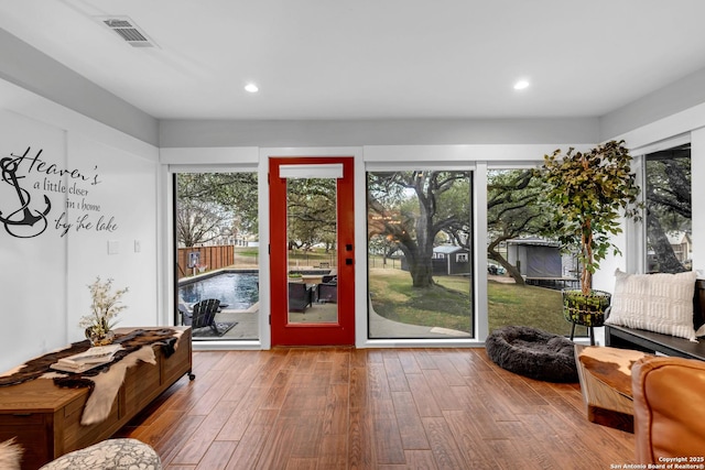 doorway featuring wood-type flooring