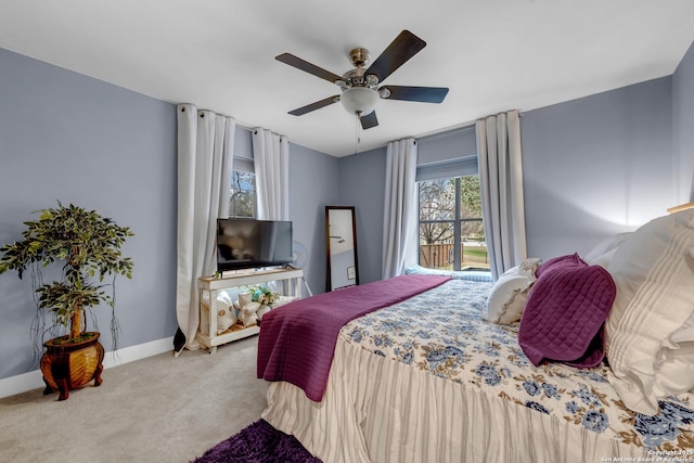 bedroom with ceiling fan and carpet flooring