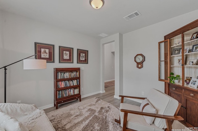 sitting room featuring light wood-type flooring