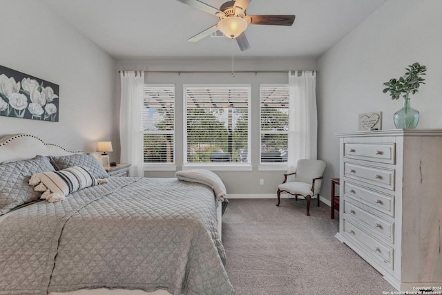 bedroom featuring ceiling fan and carpet floors