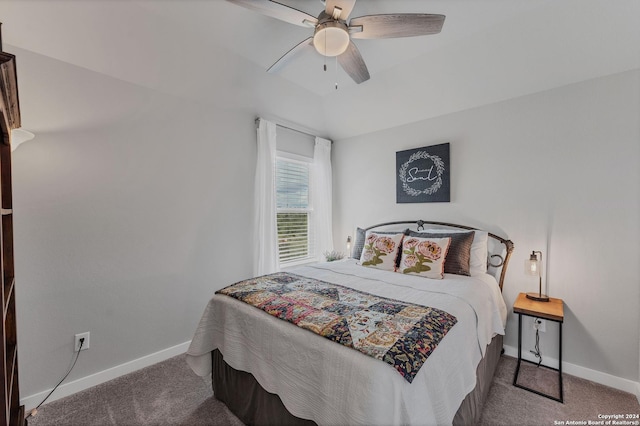 carpeted bedroom featuring ceiling fan and lofted ceiling