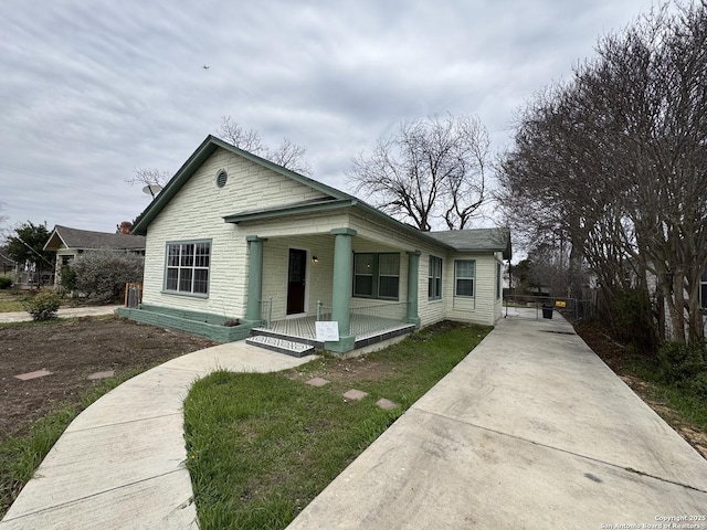 bungalow featuring covered porch