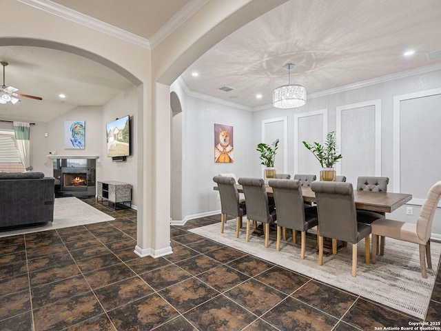 dining room featuring ornamental molding and ceiling fan