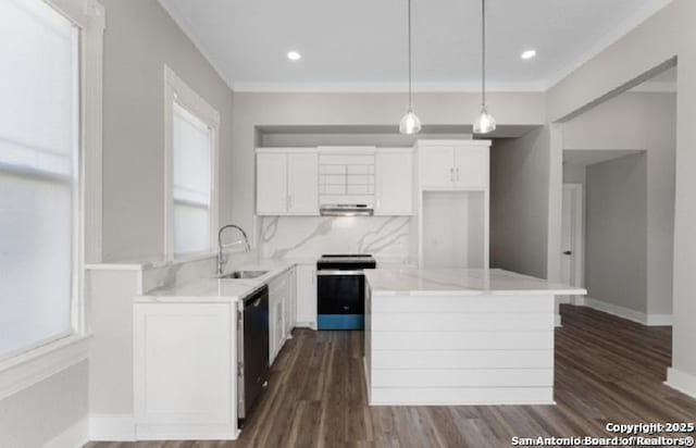 kitchen featuring white cabinetry, hanging light fixtures, a kitchen island, sink, and stainless steel electric range oven