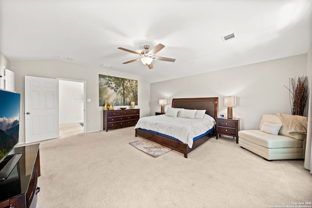 bedroom with light carpet, vaulted ceiling, and ceiling fan