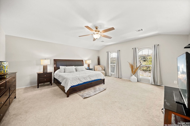 carpeted bedroom with lofted ceiling and ceiling fan