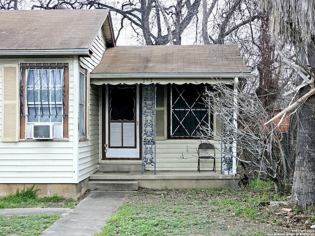 view of exterior entry featuring cooling unit