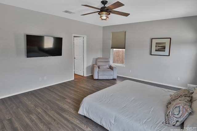 bedroom featuring dark wood-type flooring and ceiling fan