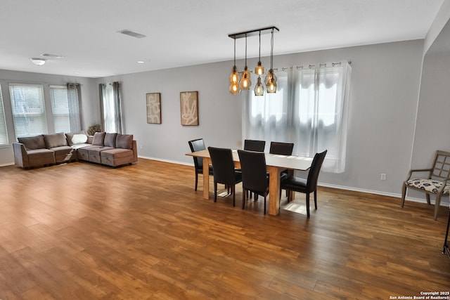 dining room featuring wood-type flooring