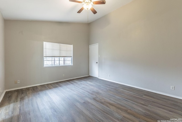 unfurnished room featuring ceiling fan and dark wood-type flooring