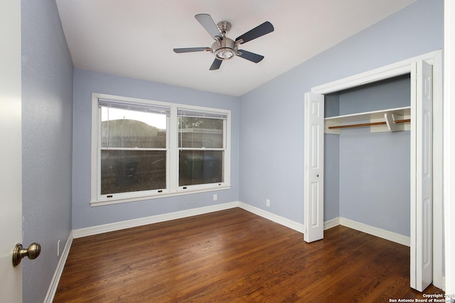 unfurnished bedroom with ceiling fan, a closet, and dark hardwood / wood-style flooring