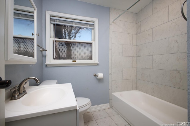 full bathroom with tiled shower / bath combo, vanity, and toilet