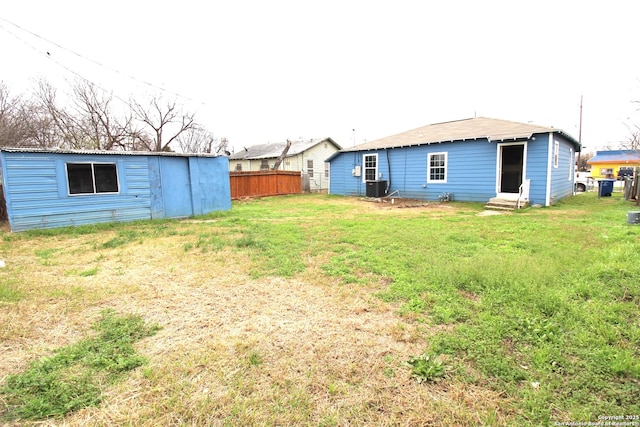 view of yard featuring central AC