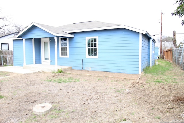 ranch-style home with a patio