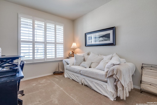 interior space with carpet flooring and baseboards