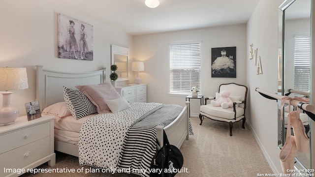 bedroom featuring light colored carpet