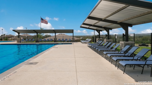 view of swimming pool featuring a patio area