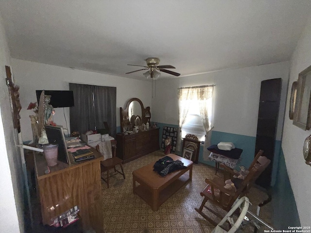 living room featuring ceiling fan