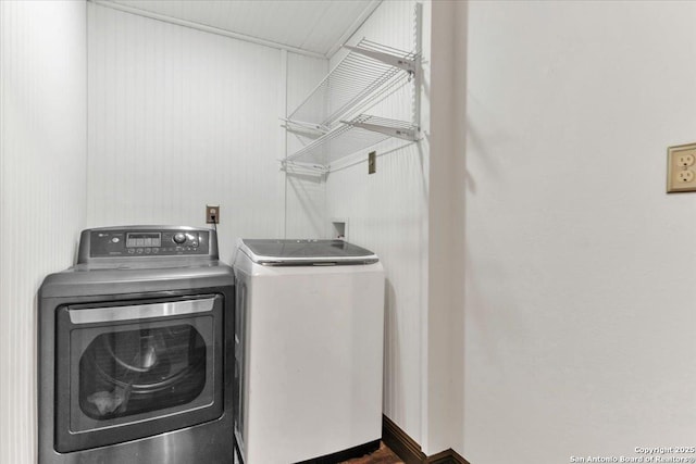 laundry room with independent washer and dryer