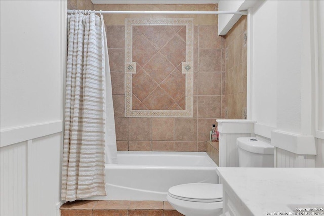 full bathroom with toilet, shower / bathtub combination with curtain, tile patterned flooring, and vanity