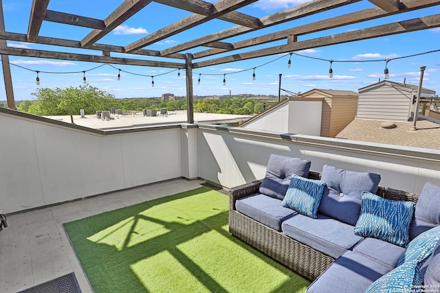 view of patio with an outdoor living space, a pergola, and a balcony