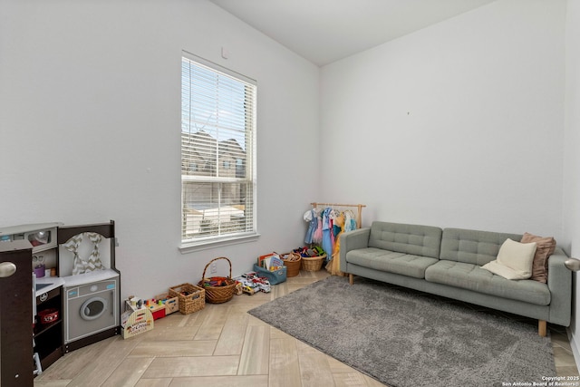 game room featuring parquet flooring