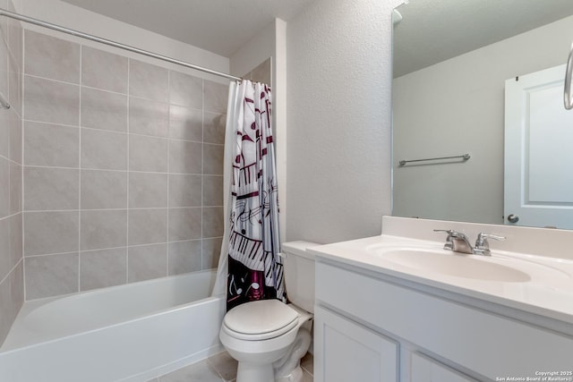 full bath with a textured wall, toilet, vanity, tile patterned floors, and shower / tub combo with curtain