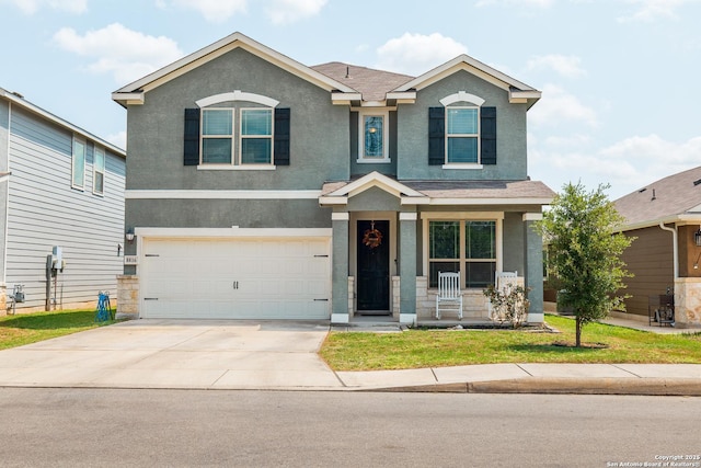 craftsman house with covered porch and a garage