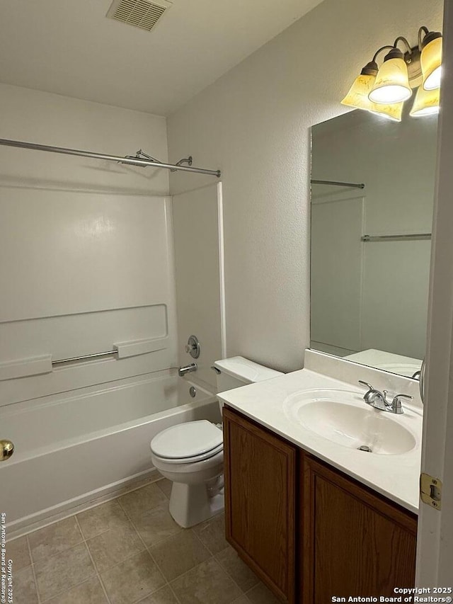 full bathroom featuring tile patterned floors, toilet,  shower combination, and vanity