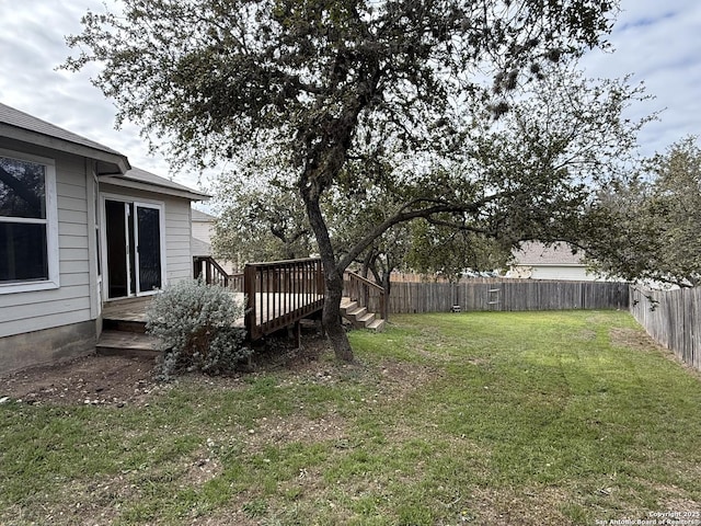 view of yard featuring a deck