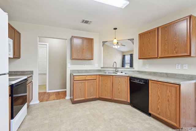 kitchen with dishwasher, electric stove, light countertops, and decorative light fixtures