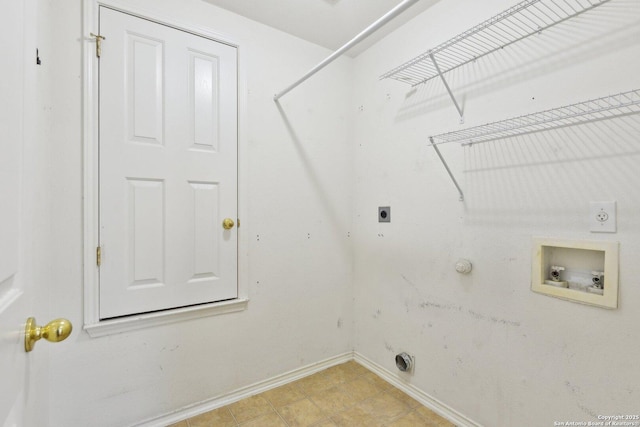washroom featuring hookup for a washing machine, gas dryer hookup, electric dryer hookup, laundry area, and baseboards