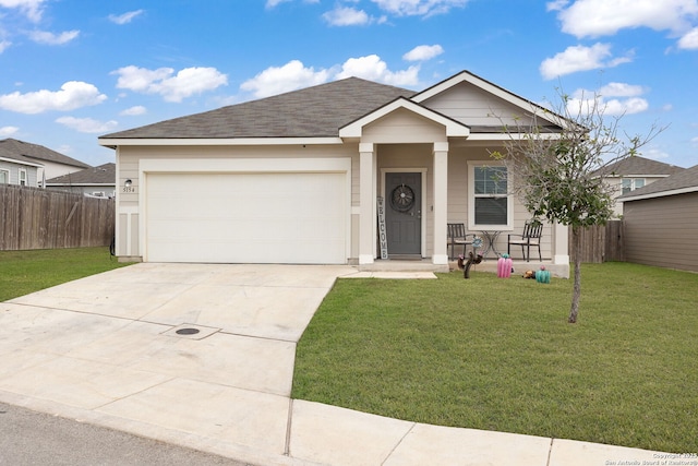 view of front of house with a front lawn and a garage