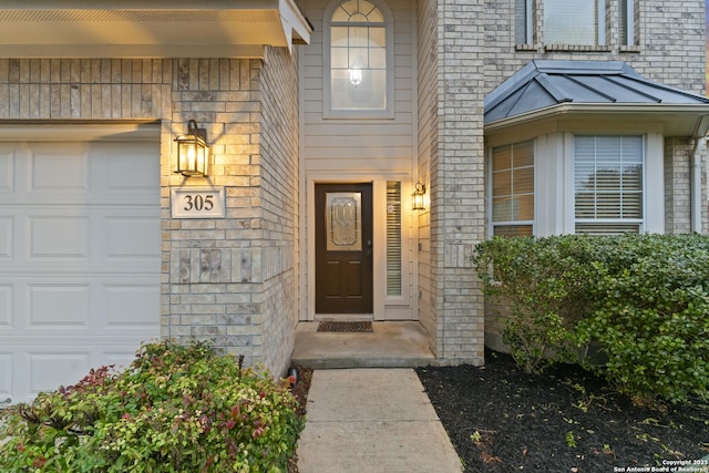 property entrance featuring a garage