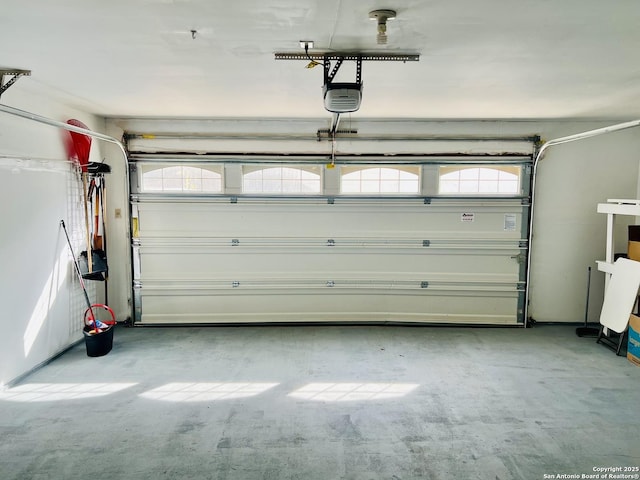 garage featuring a garage door opener