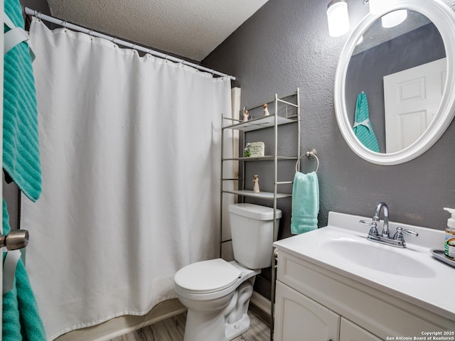 bathroom featuring toilet, a textured ceiling, vanity, hardwood / wood-style floors, and a shower with shower curtain