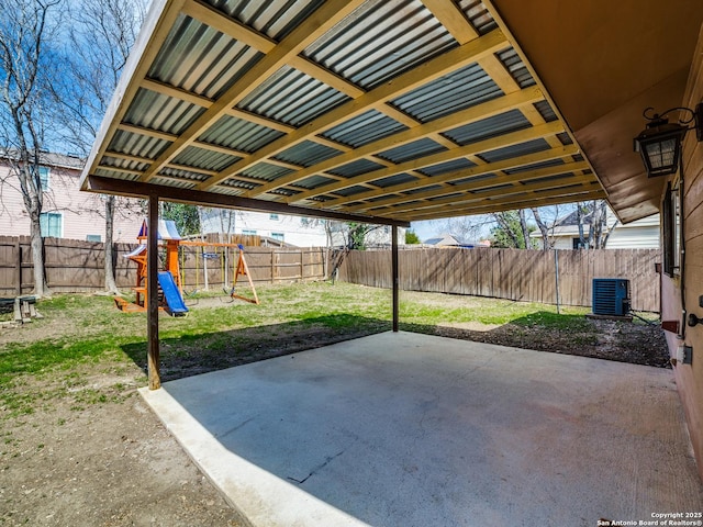 view of patio / terrace featuring a playground and central AC unit