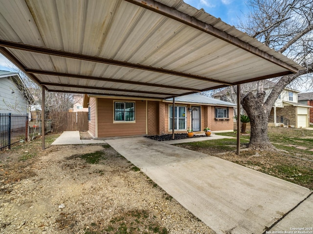 exterior space with a carport