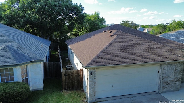 exterior space with a garage